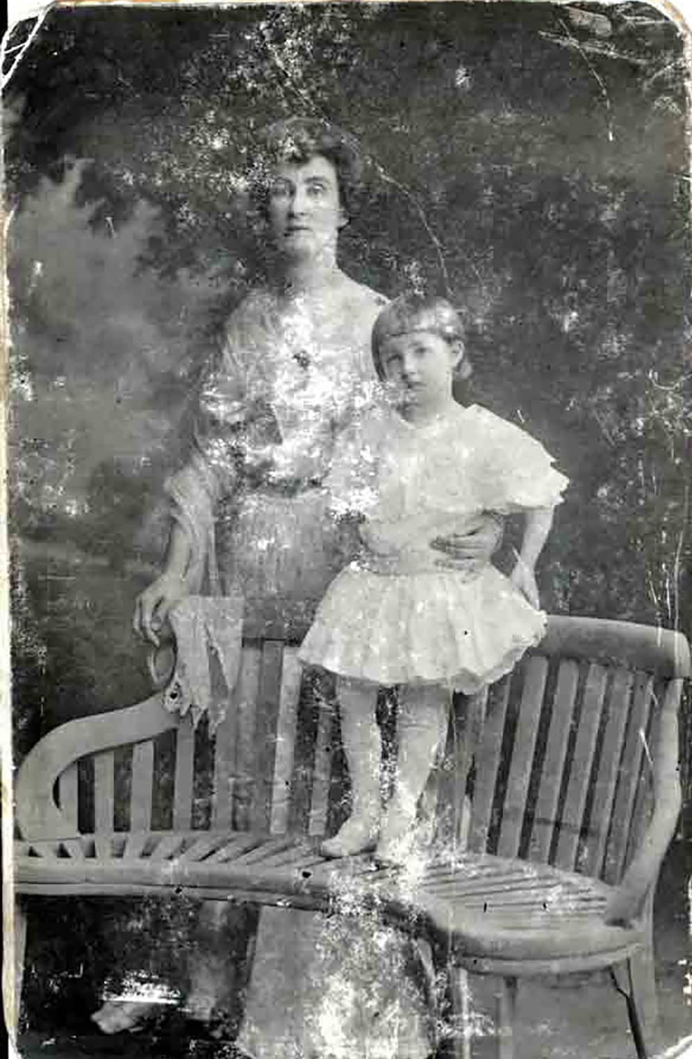 damaged photo of woman and child
